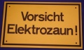 Hinweisschild Vorsicht Elektrozaun ca. 25x15cm gelb gelocht